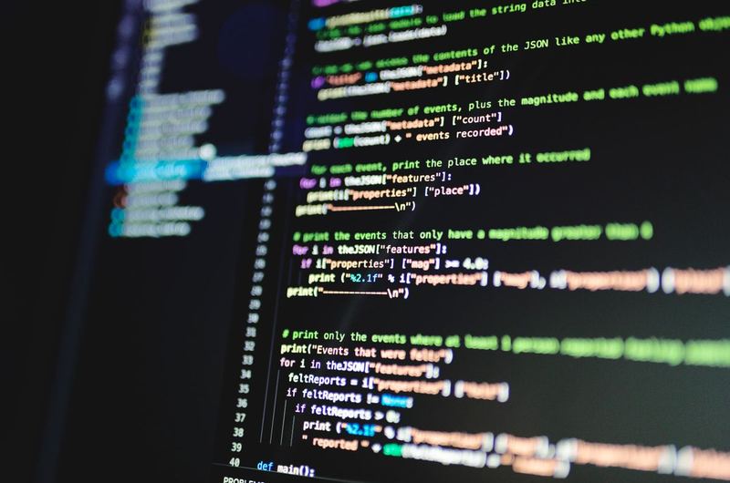 Lines of code on a monitor representing the server-side signals that affect search engine crawl allocation