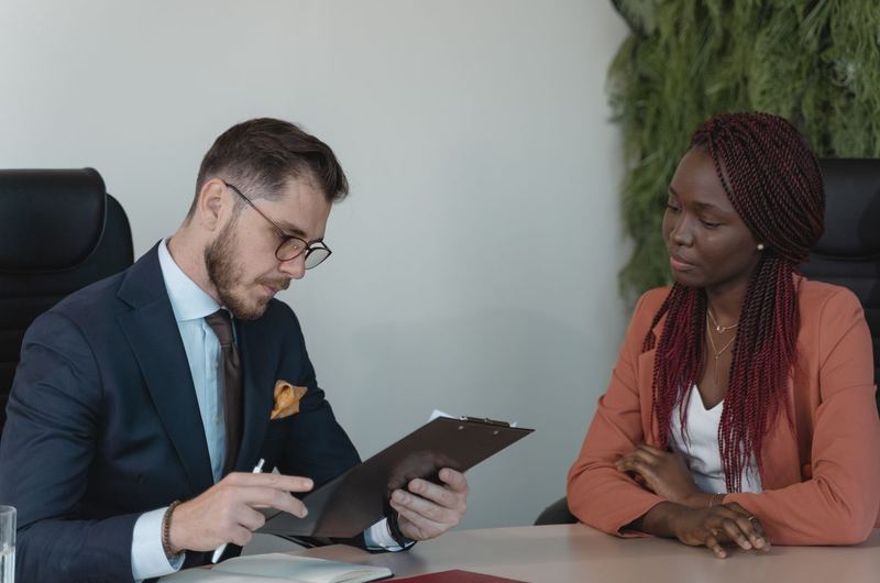 A professional reviewing credentials during the hiring process for a digital marketing role