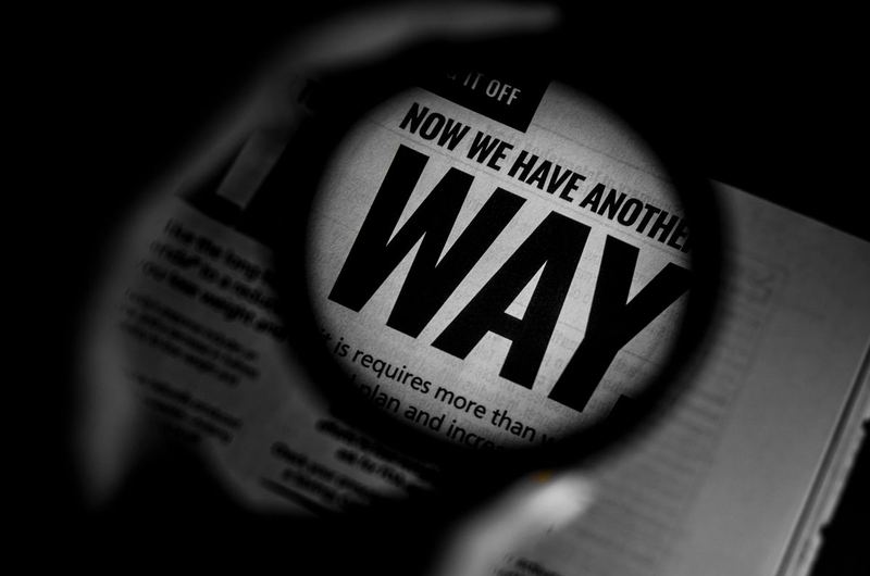 Text viewed through a magnifying lens, representing how search engines analyze keyword frequency in content