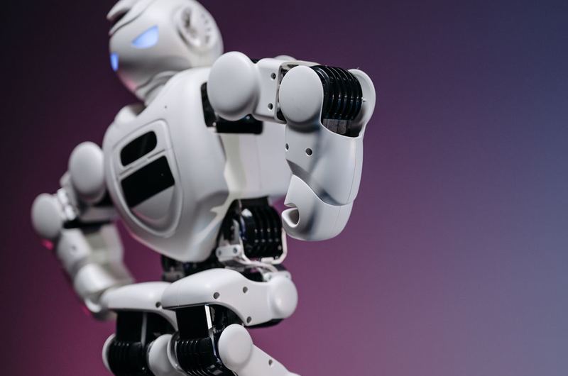 A modern AI robot representing the large language models that the llms.txt protocol communicates with
