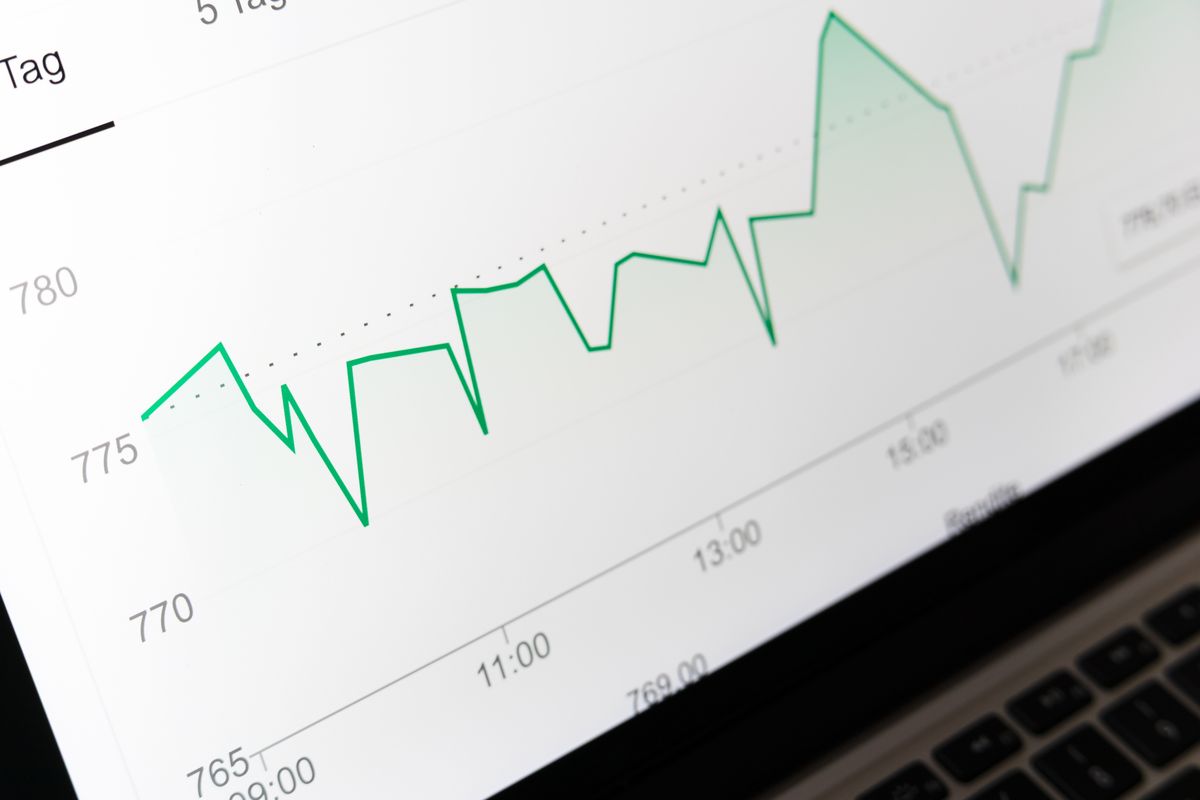 A laptop open to website data, where common SEO mistakes are diagnosed