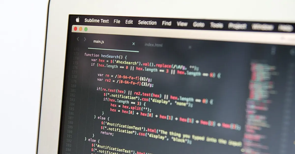 Close-up of code displayed on a laptop, illustrating technical SEO for a JavaScript website