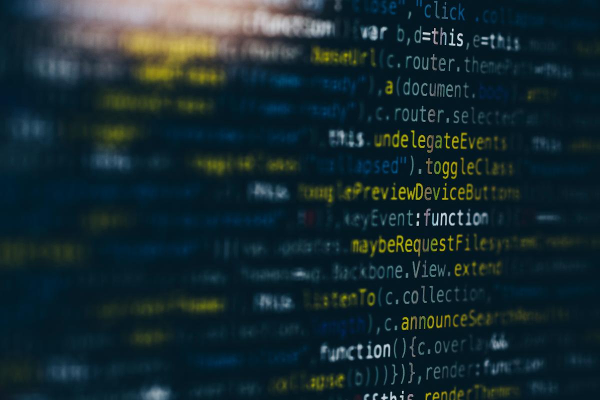 Computer screen showing JavaScript code, representing the intersection of web development and SEO