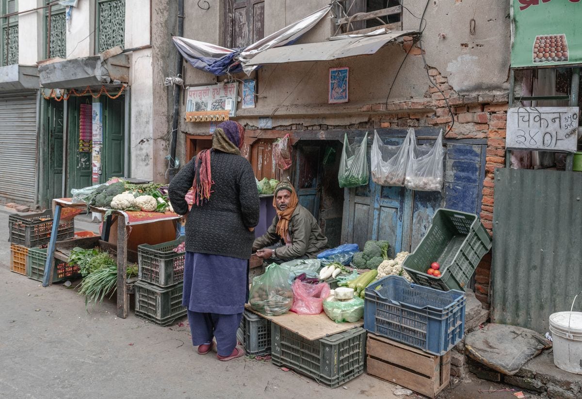 A Nepali street lined with small shops and local vendors
