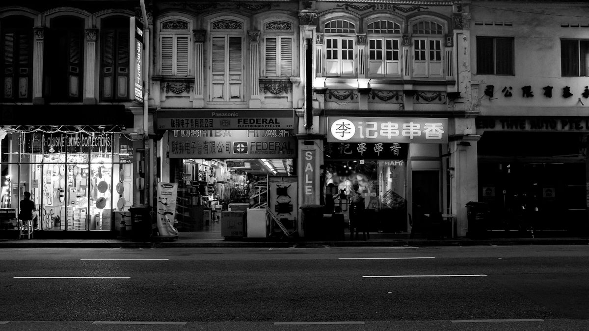 A row of storefronts along a street, the local businesses that compete on Google Maps