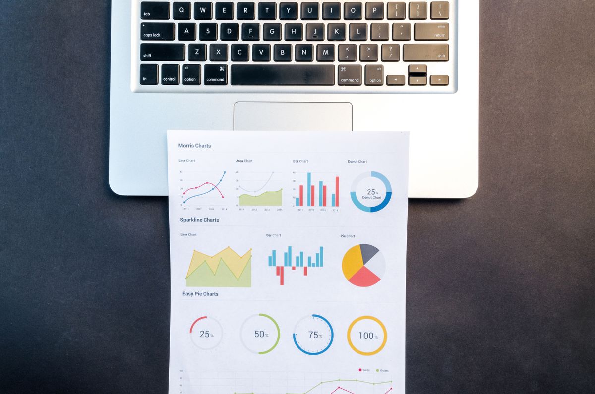 An SEO specialist studying website analytics on a laptop